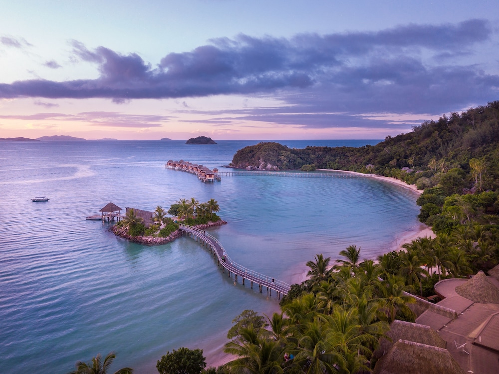 Aerial view of the overwater bungalows at Likuliku Lagoon Resort, Malolo Island, Fiji