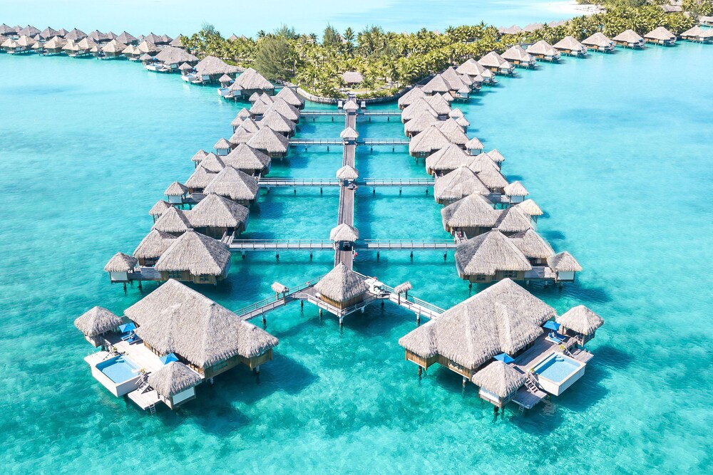 Overwater bungalows in a row at St. Regis Bora Bora