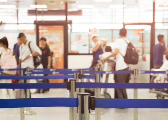 People waiting in airport security line