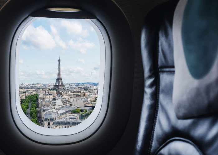 View of Eiffel Tower out of plane window