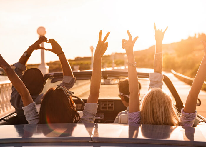 group-happy-roadtrip-sunset