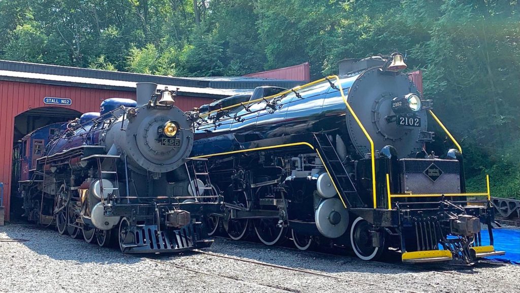 Reading Blue Mountain & Northern steam engines pulling out of the station