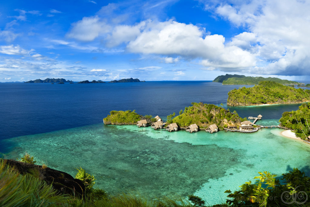 Aerial view of overwater bungalows at Misool Eco Resort, Raja Ampat, Indonesia