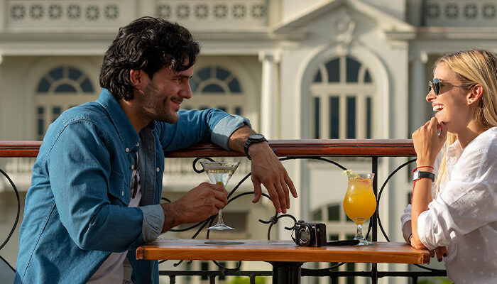 Two people drinking at a cafe in Panama