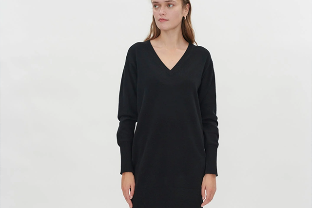 Female model wearing Gobi Cashmere Dress in black.